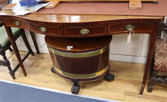 A George III mahogany serpentine front serving table W.146cm